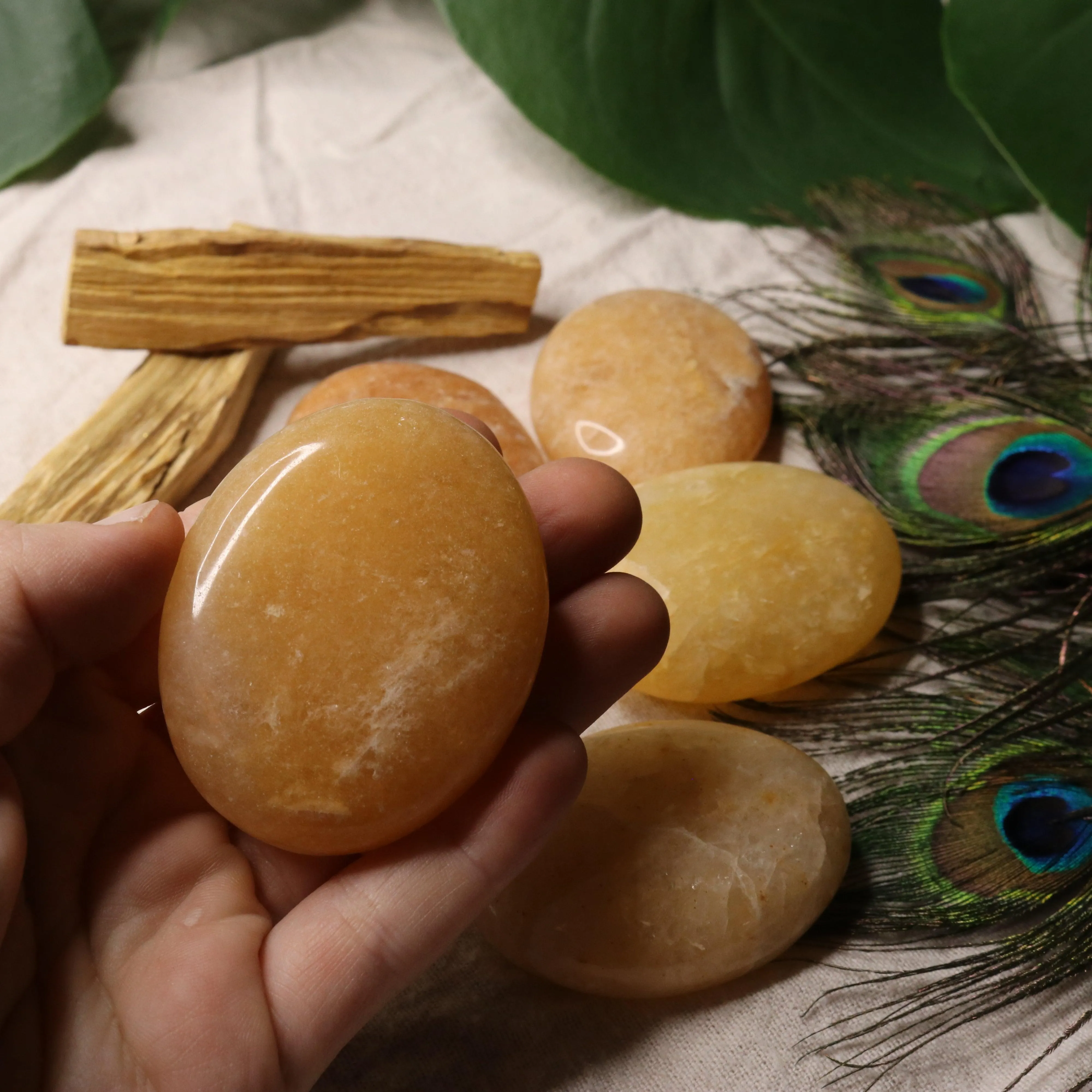 Golden Healer Quartz Pillow Palm Carvings